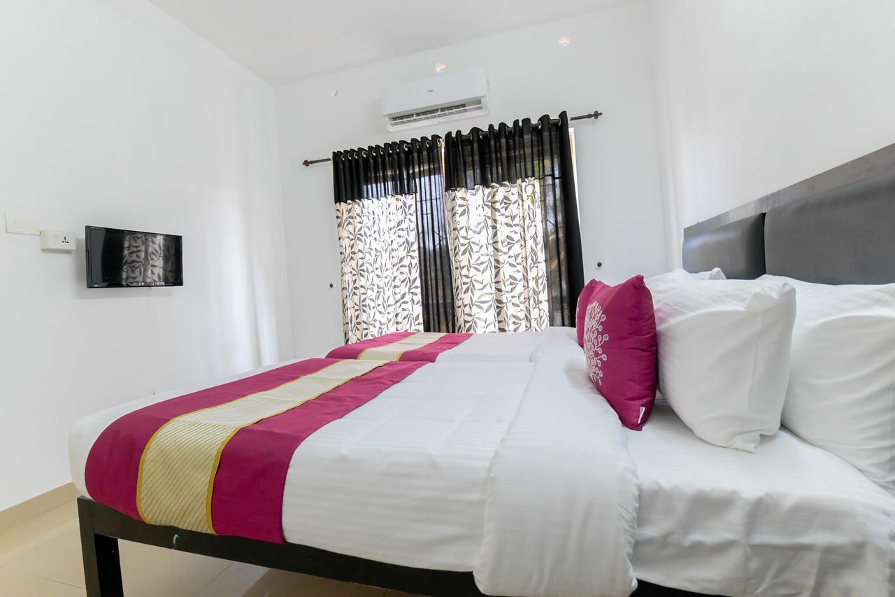 Oyo 11891 Amare Beach Resorts Alappuzha Buitenkant foto